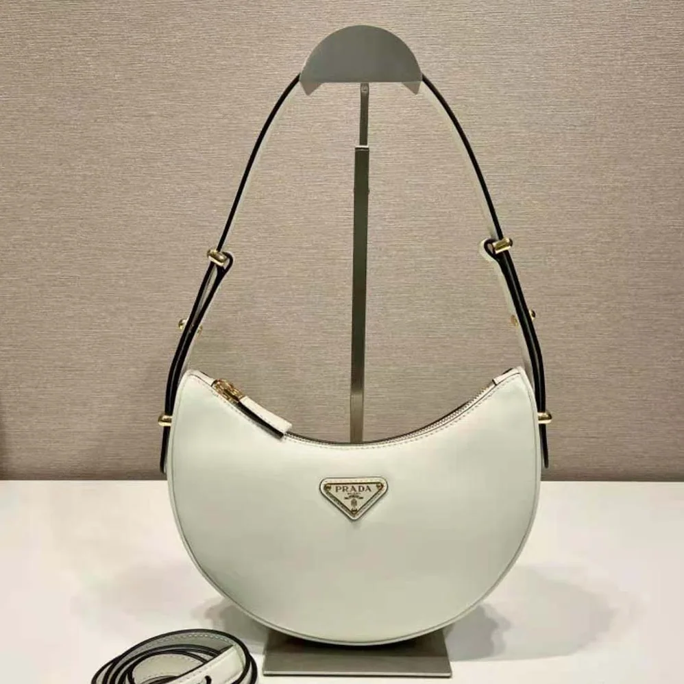 Prada Leather Shoulder Bag with Enameled Metal Triangle Logo for Women in White