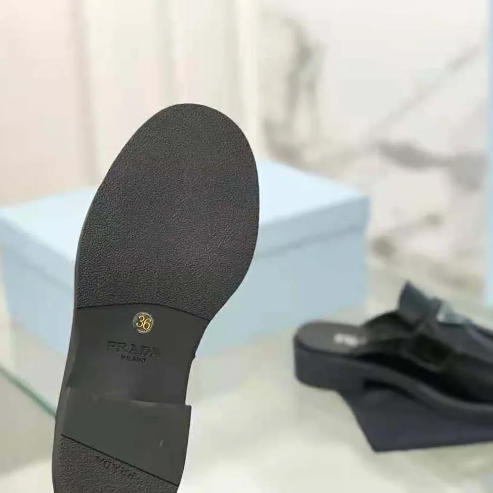 Prada Chocolate Brushed Leather Mules for Women in Black