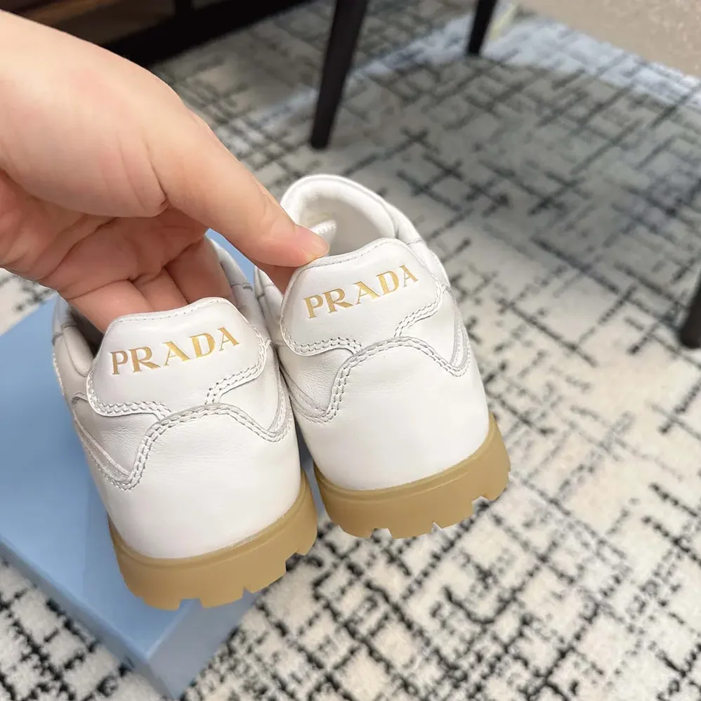 Prada Downtown Nappa Leather Sneakers for Unisex in White Prada Downtown Nappa Leather Sneakers for Unisex in White