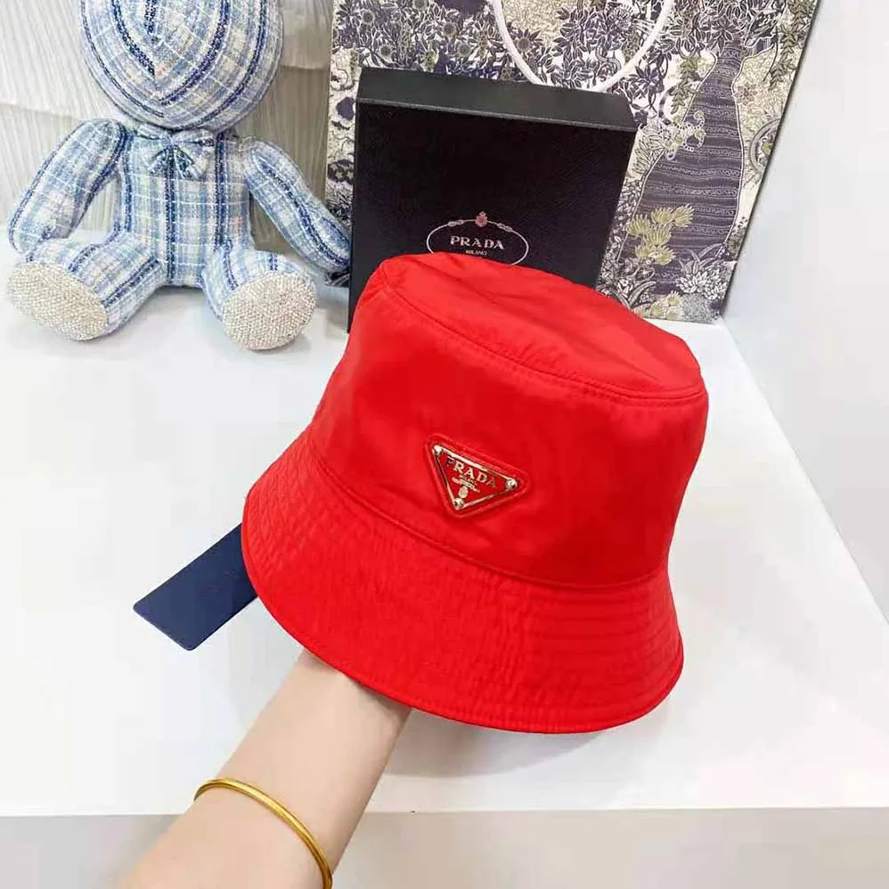 Prada Nylon Bucket Hat Decorated with the Triangle Logo for Women in Red