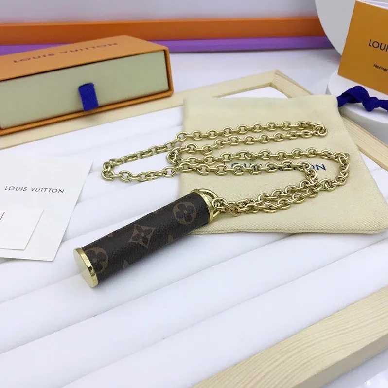 Louis Vuitton Cylinder Pendant Necklace Gold Tone Louis Vuitton Cylinder Pendant Necklace Gold Tone