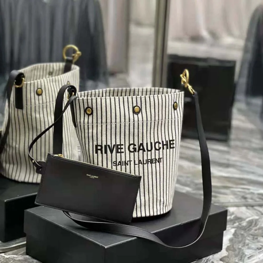 Saint Laurent YSL Rive Gauche Bucket Bag in Striped Canvas and Leather for Women Saint Laurent YSL Rive Gauche Bucket Bag in Striped Canvas and Leather for Women