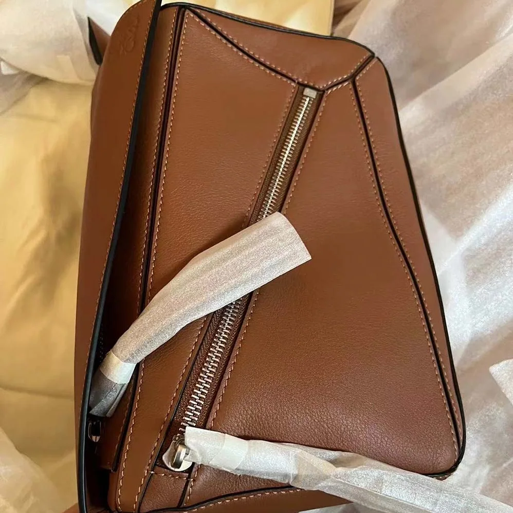 Loewe Small Puzzle Bumbag in Classic Calfskin for Unisex in Brown