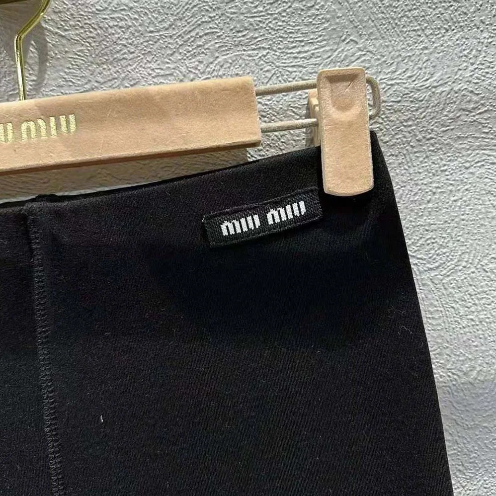 Miu Miu Silk Jersey Pants with Logo Patch for Women in Black Miu Miu Silk Jersey Pants with Logo Patch for Women in Black