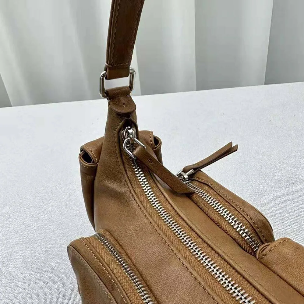 Miu Miu Pocket Nappa Leather Bag with Embossed Lettering Logo for Women in Brown Miu Miu Pocket Nappa Leather Bag with Embossed Lettering Logo for Women in Brown