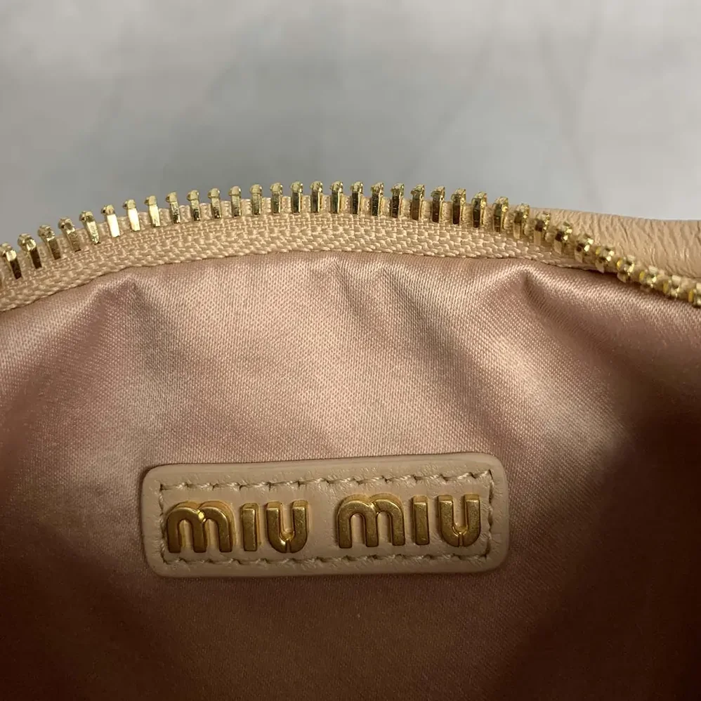 Miu Miu Wander Matelassé Nappa Leather Hobo Bag for Women in Brown Miu Miu Wander Matelassé Nappa Leather Hobo Bag for Women in Brown