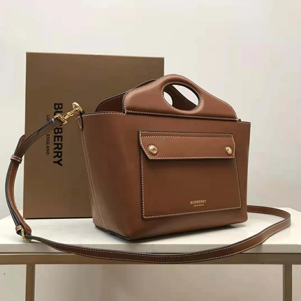 Burberry Mini Leather Soft Pocket Tote for Women in Brown Burberry Mini Leather Soft Pocket Tote for Women in Brown