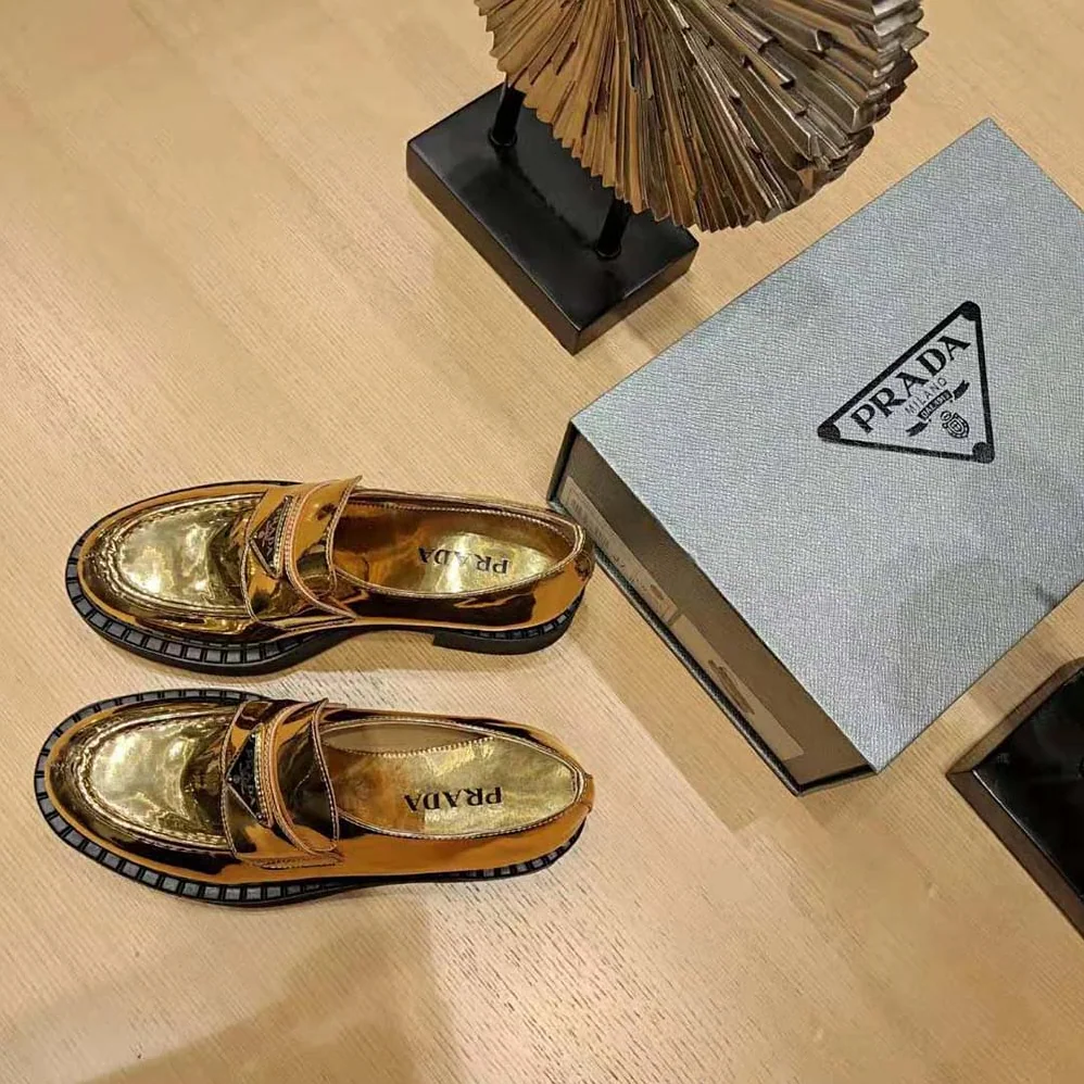 Prada Metallic Leather Loafers for Women in Gold