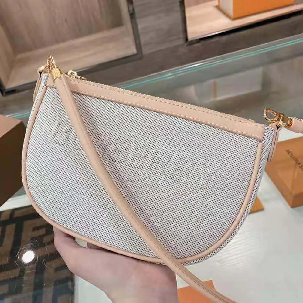 Burberry Embossed Logo Canvas and Leather Olympia Pouch for Women
