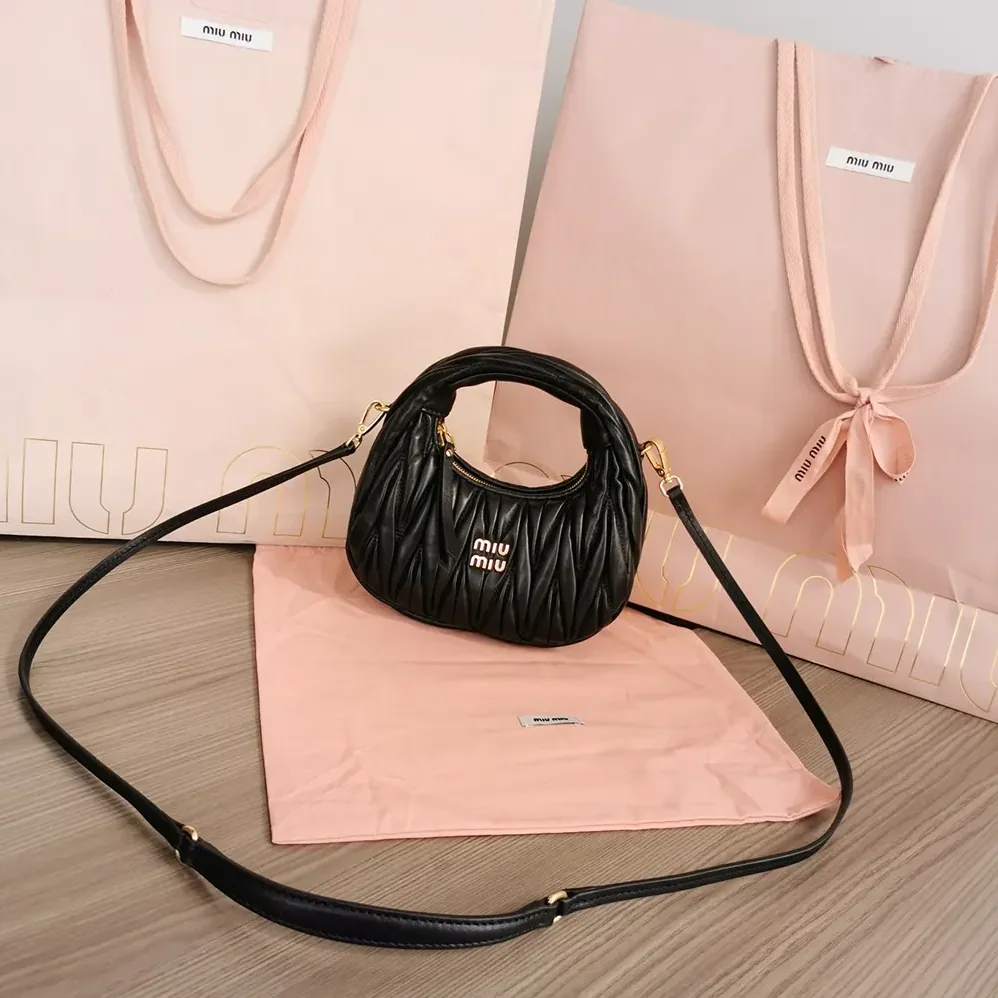 Miu Miu Wander Matelassé Nappa Leather Hobo Mini-Bag for Women in Black Miu Miu Wander Matelassé Nappa Leather Hobo Mini-Bag for Women in Black