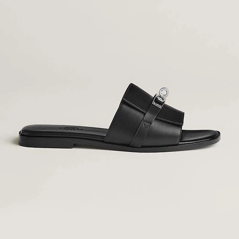 Hermes Giulia Sandal in Calfskin with Iconic Palladium-Plated Kelly Buckle for Women in Black Hermes Giulia Sandal in Calfskin with Iconic Palladium-Plated Kelly Buckle for Women in Black