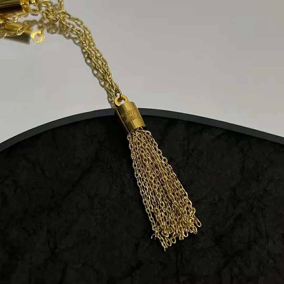 Celine Triomphe Folk Pompons Sautoir in Brass with Gold Finish for Women