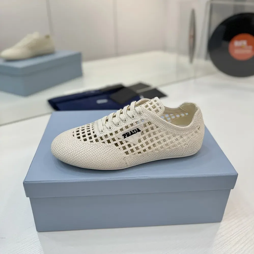 Prada Collapse Crochet Laced Sneakers for Unisex in White Prada Collapse Crochet Laced Sneakers for Unisex in White