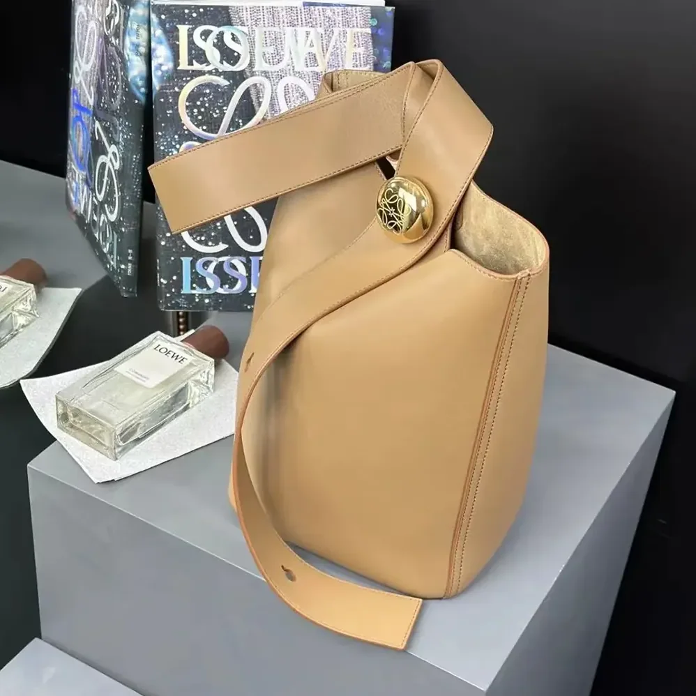 Loewe Medium Pebble Bucket Bag in Mellow Calfskin for Unisex in Brown