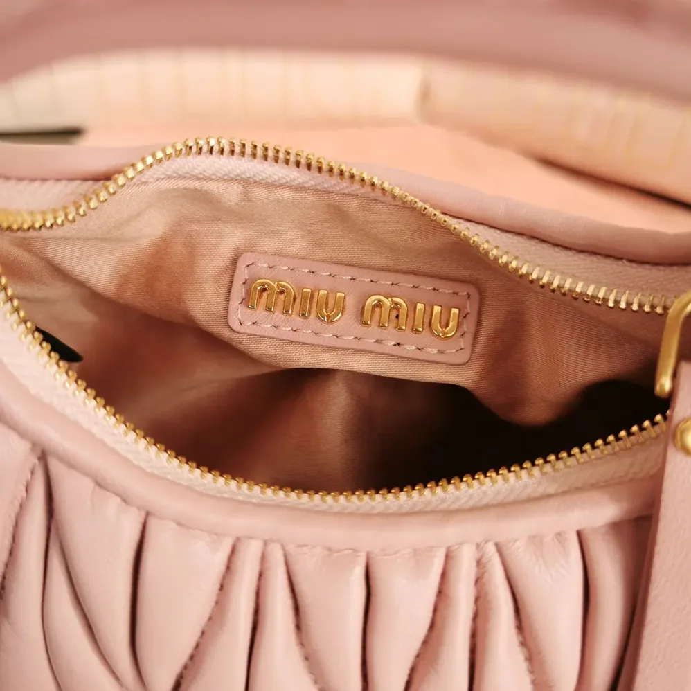 Miu Miu Wander Matelassé Nappa Leather Hobo Mini-Bag for Women in Powder Pink
