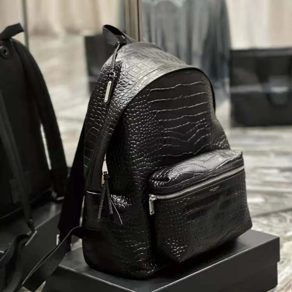 Saint Laurent YSL City Backpack in Crocodile for Women in Embossed Leather Saint Laurent YSL City Backpack in Crocodile for Women in Embossed Leather