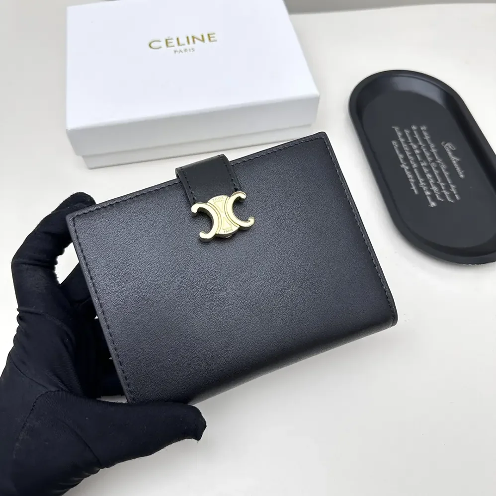 Celine Medium Strap Wallet Nino in Supple Grained Calfskin for Women in Black Celine Medium Strap Wallet Nino in Supple Grained Calfskin for Women in Black