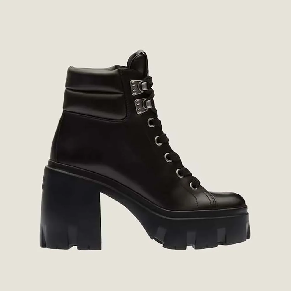 Miu Miu Leather Booties with EVA Sole with Logo for Women in Black Miu Miu Leather Booties with EVA Sole with Logo for Women in Black