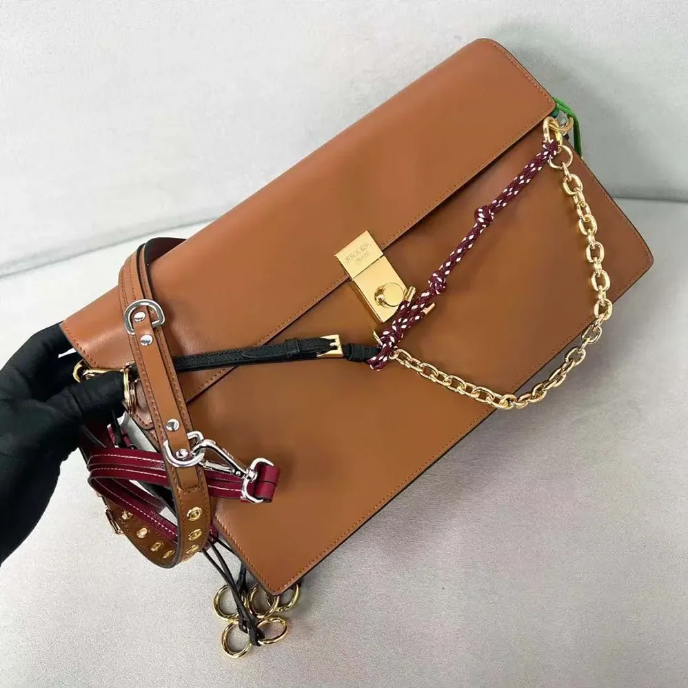 Prada Soft Sound Large Leather Shoulder Bag with Charms for Women in Brown
