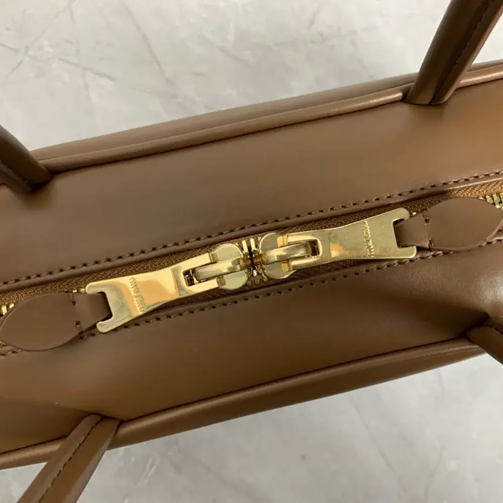 Miu Miu Beau Leather Top-handle Bag for Women in Brown