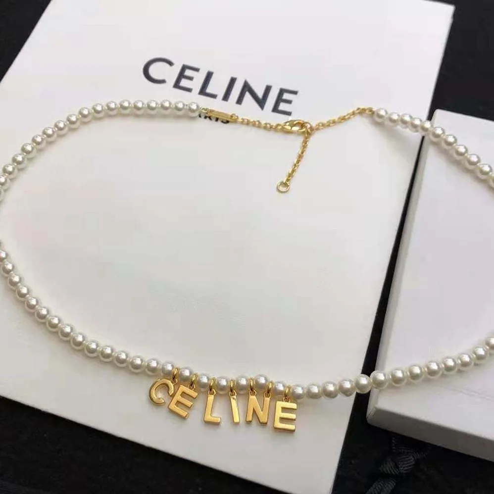Celine Paris Pearl Bracelet in Brass with Gold Finish and Glass Pearls for Women Celine Paris Pearl Bracelet in Brass with Gold Finish and Glass Pearls for Women