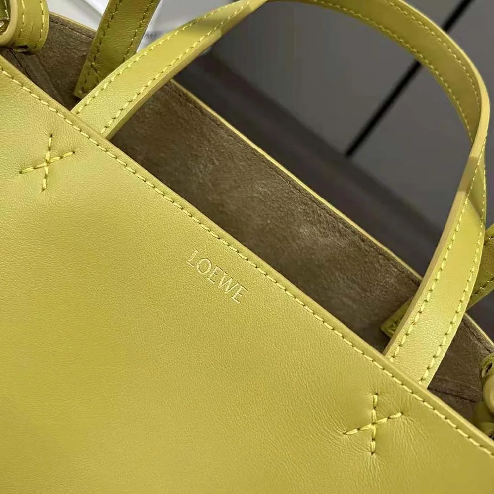 Loewe Mini Puzzle Fold Tote in Shiny Calfskin for Unisex in Yellow Loewe Mini Puzzle Fold Tote in Shiny Calfskin for Unisex in Yellow