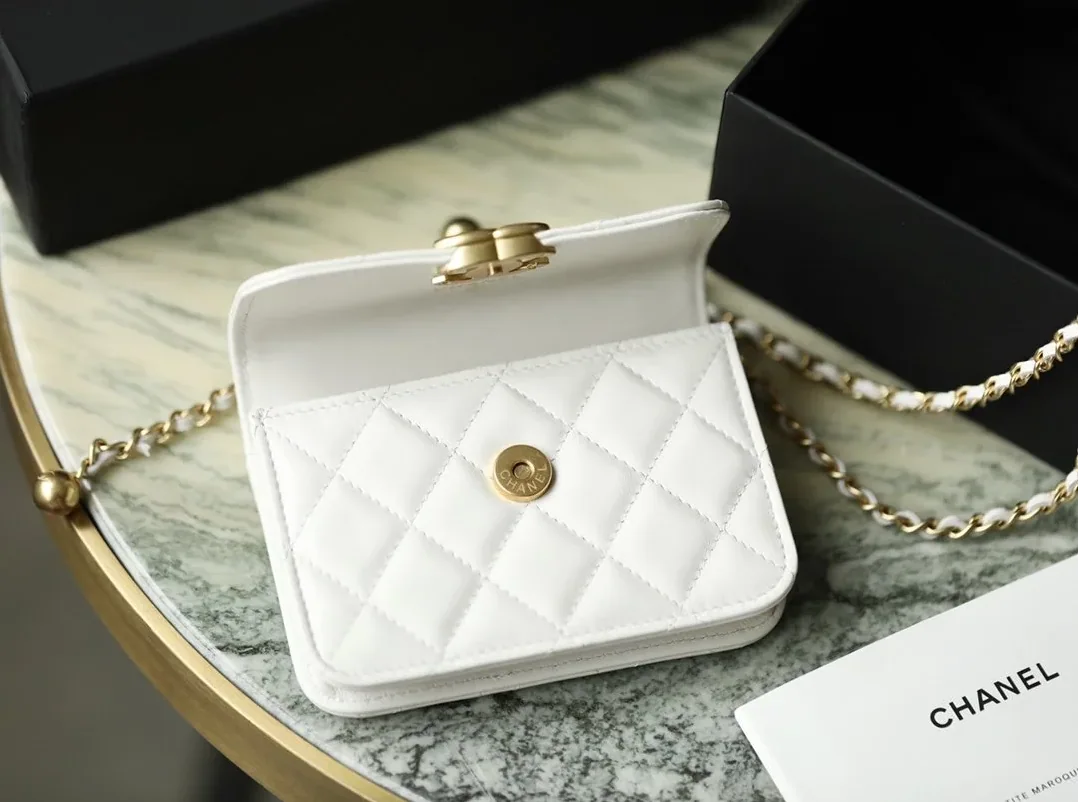 Chanel CO-CO Clutch With Chain in Gold Toned Hardware White Chanel CO-CO Clutch With Chain in Gold Toned Hardware White