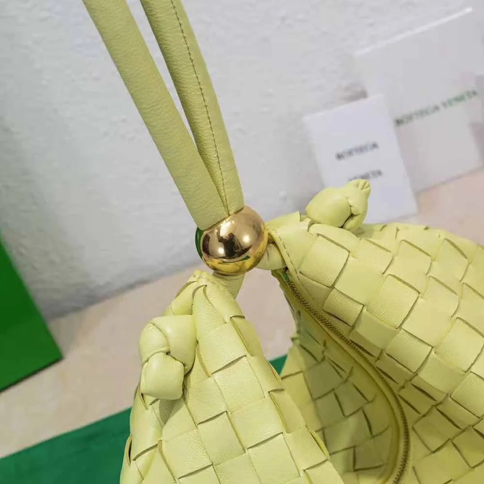 Bottega Veneta Turn Medium Intrecciato Leather Pouch with Adjustable Strap for Women in Yellow Bottega Veneta Turn Medium Intrecciato Leather Pouch with Adjustable Strap for Women in Yellow