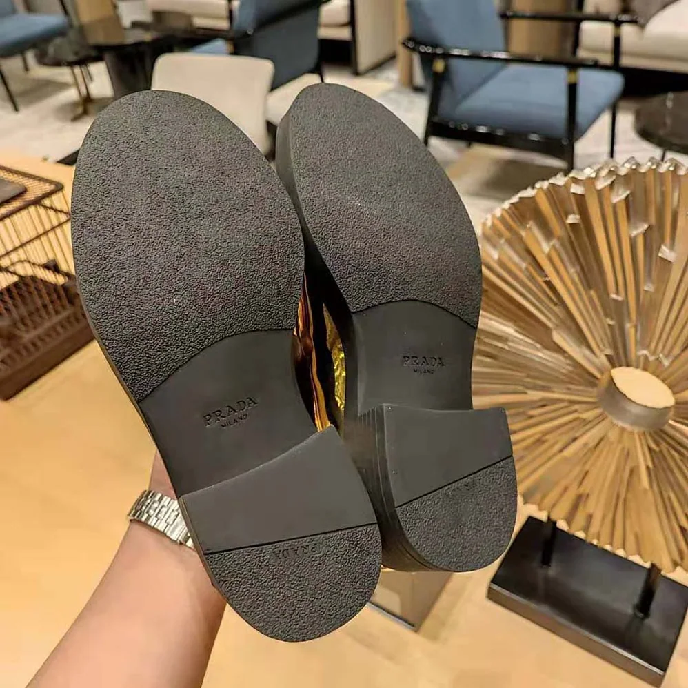 Prada Metallic Leather Loafers for Women in Gold