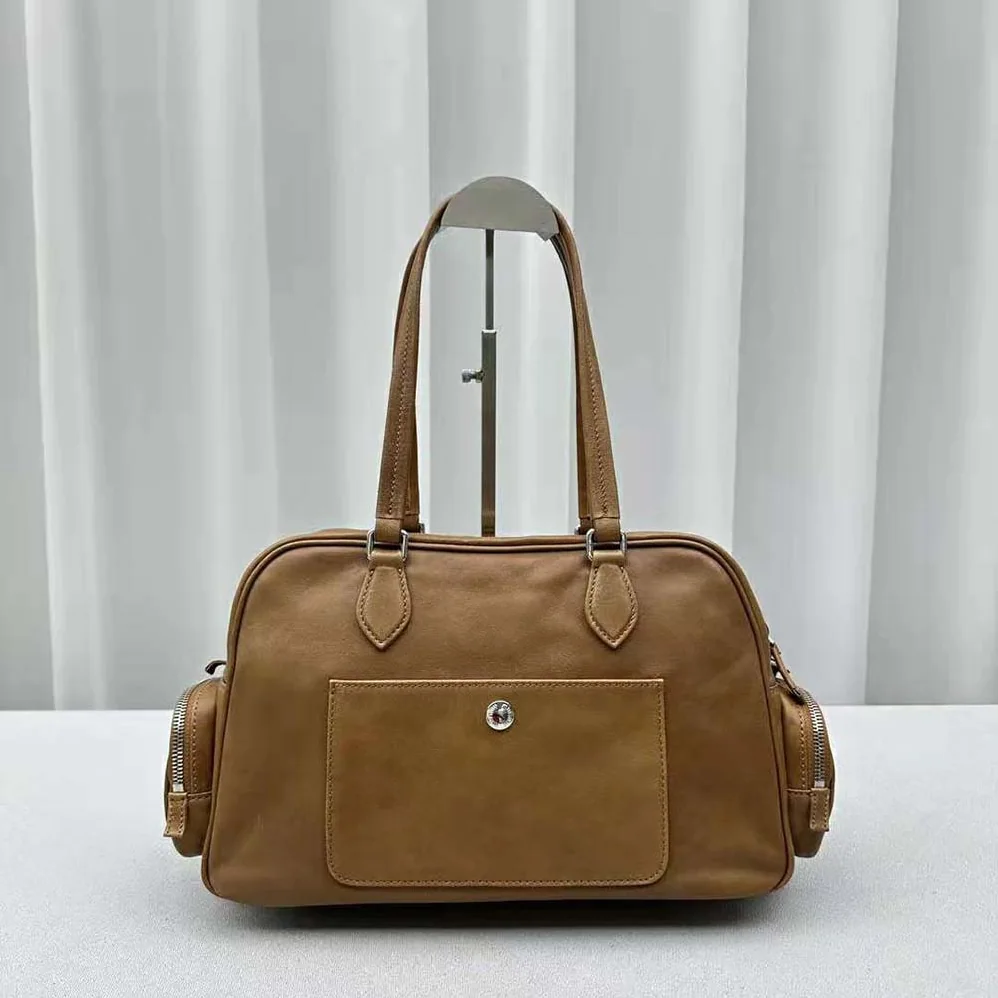 Miu Miu Nappa Leather Top-handle Bag with Embossed Lettering Logo for Women in Brown