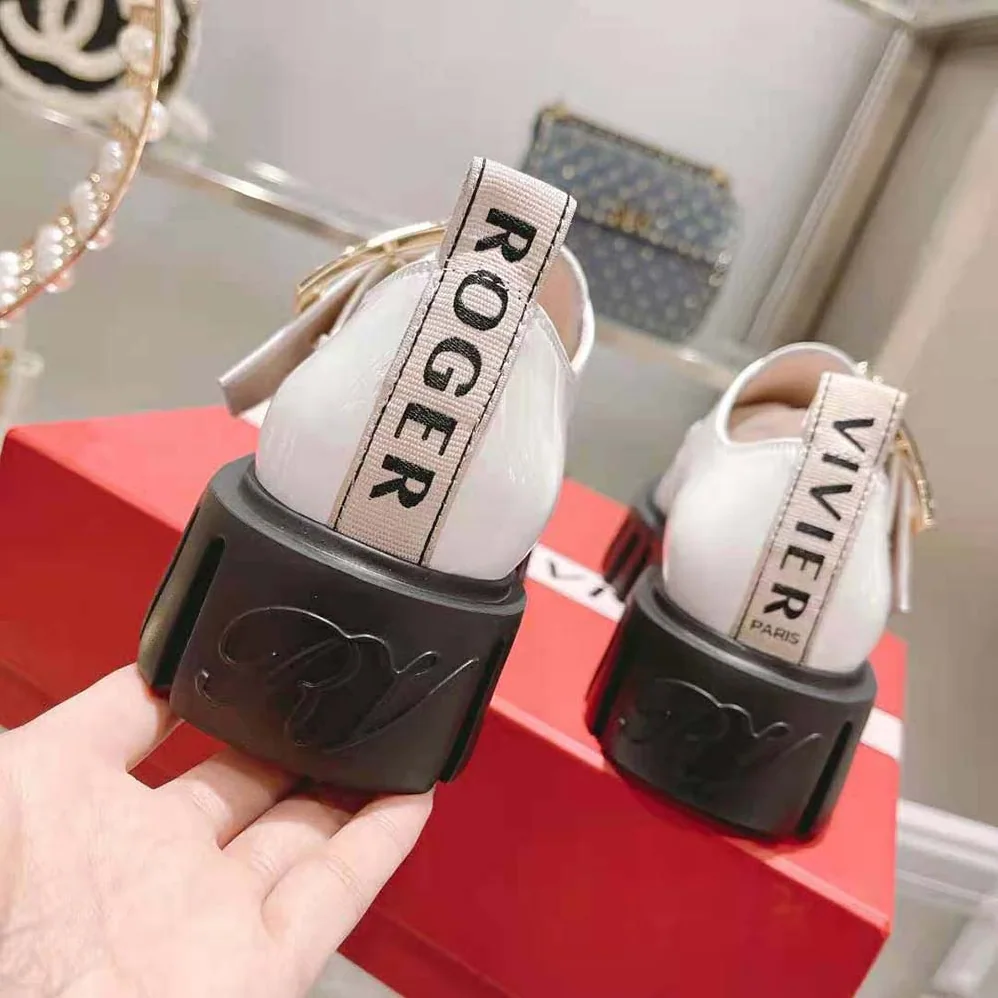 Roger Vivier Viv' Go-Thick Metal Buckle Loafers in Patent Leather for Women in White Roger Vivier Viv' Go-Thick Metal Buckle Loafers in Patent Leather for Women in White