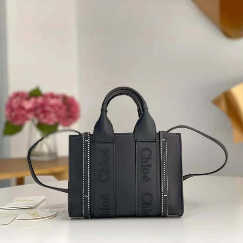 Chloe Mini Woody Tote Bag with Embroidered Chloé Logo for Women in Black Chloe Mini Woody Tote Bag with Embroidered Chloé Logo for Women in Black