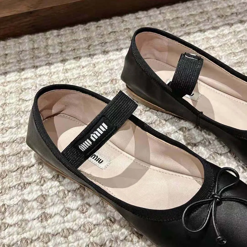 Miu Miu Leather Ballerinas with Fabric Logo Label for Women in Black