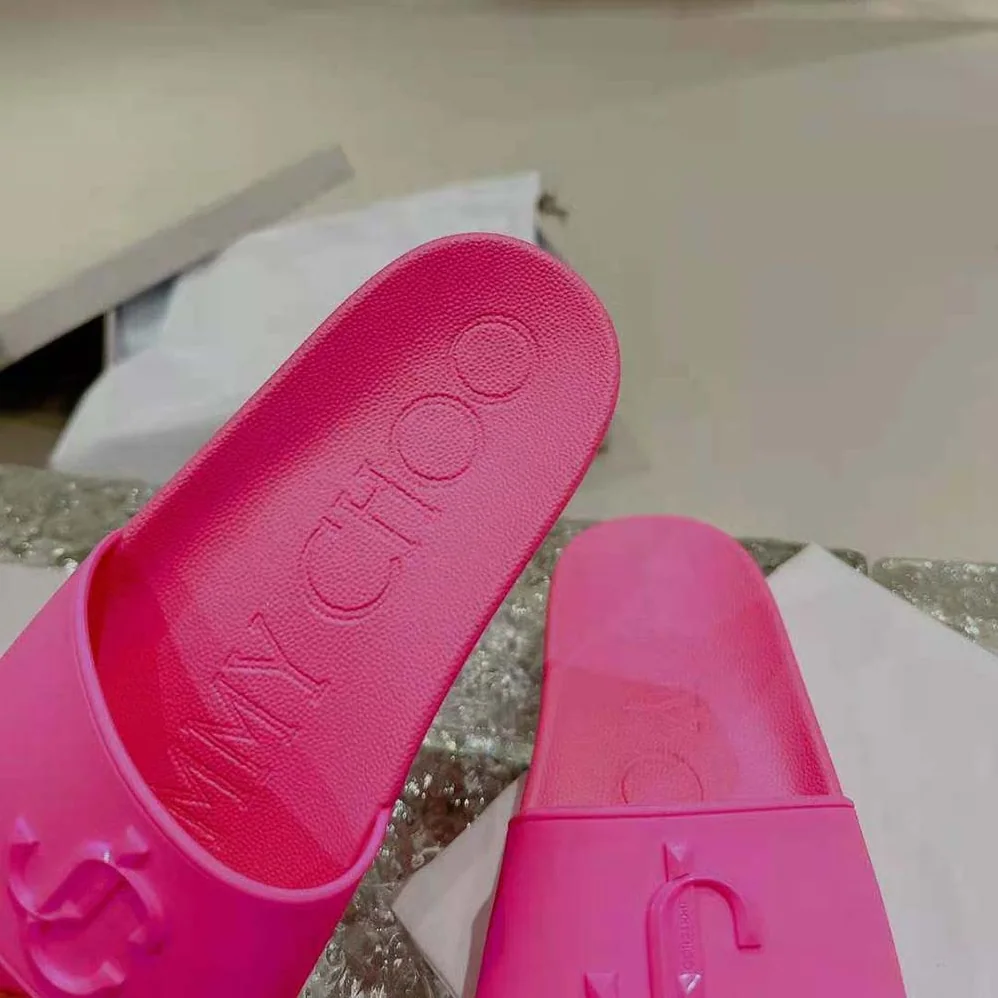 Jimmy Choo Port/F Neon Pink Rubber Slides with JC Monogram for Women Jimmy Choo Port/F Neon Pink Rubber Slides with JC Monogram for Women