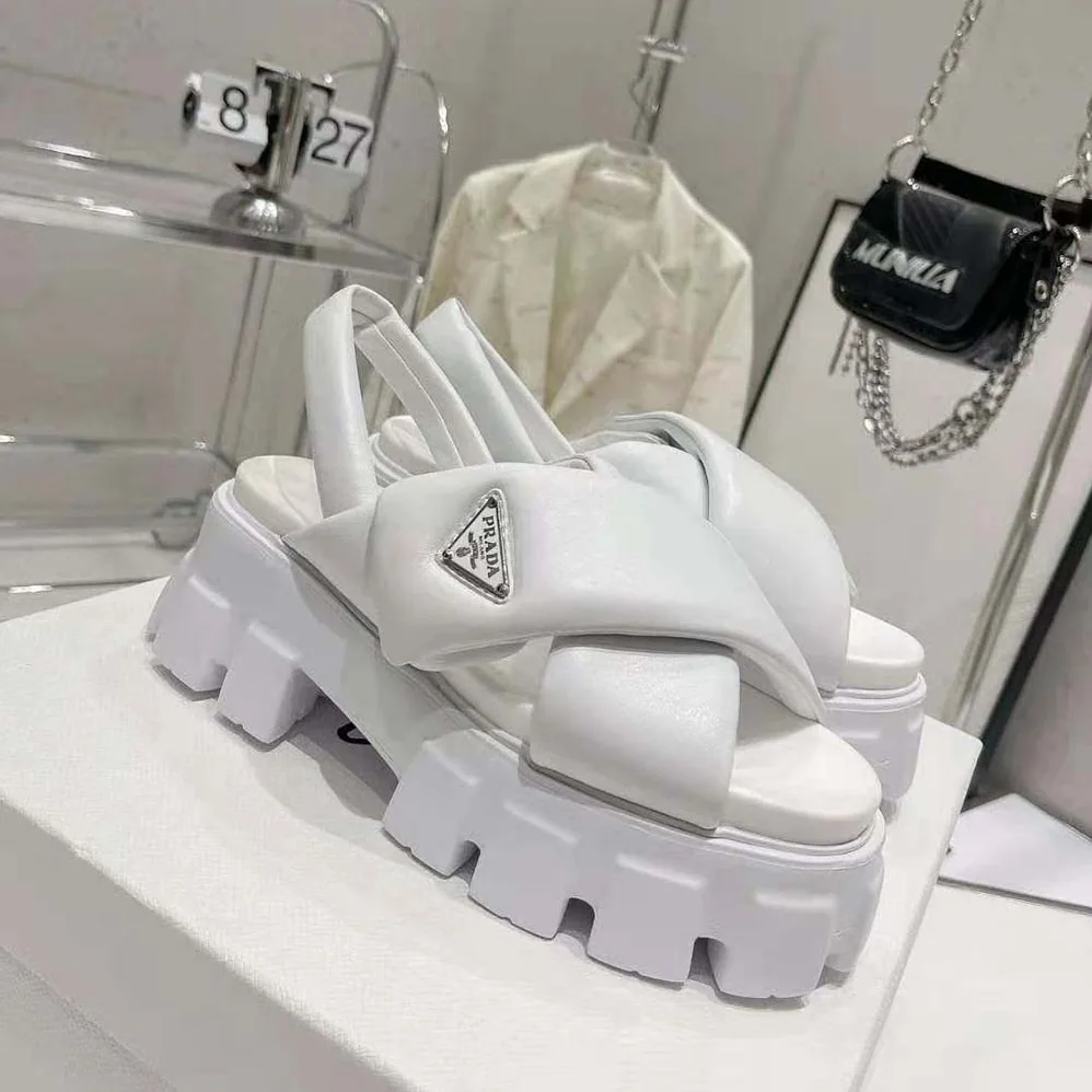 Prada Monolith Padded Nappa Leather Sandals for Women in White Prada Monolith Padded Nappa Leather Sandals for Women in White