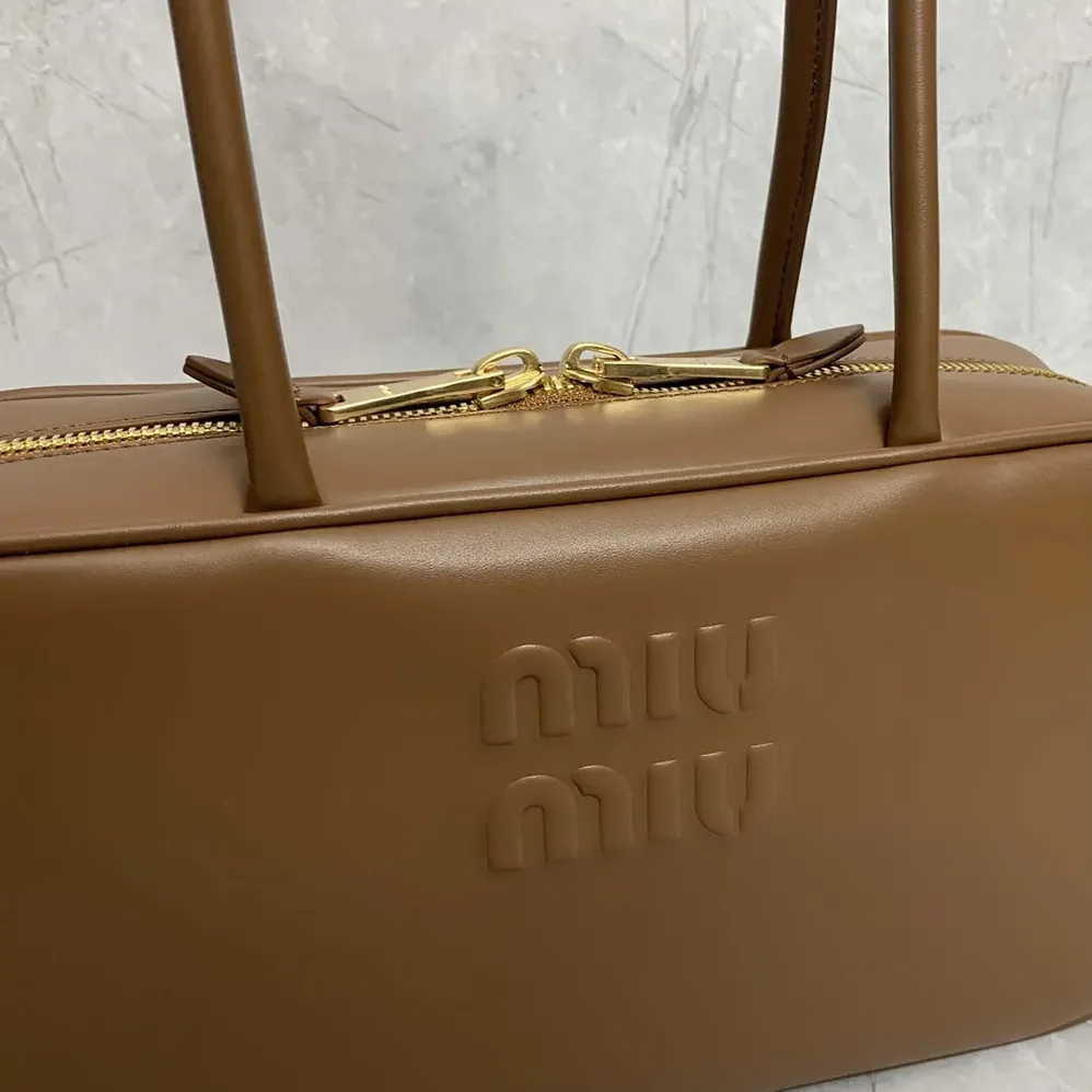 Miu Miu Beau Leather Top-handle Bag for Women in Brown