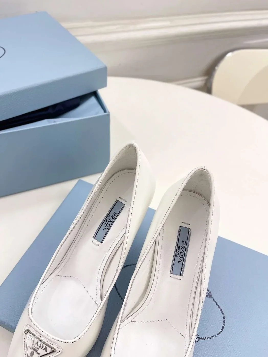 Prada Spike Pumps White