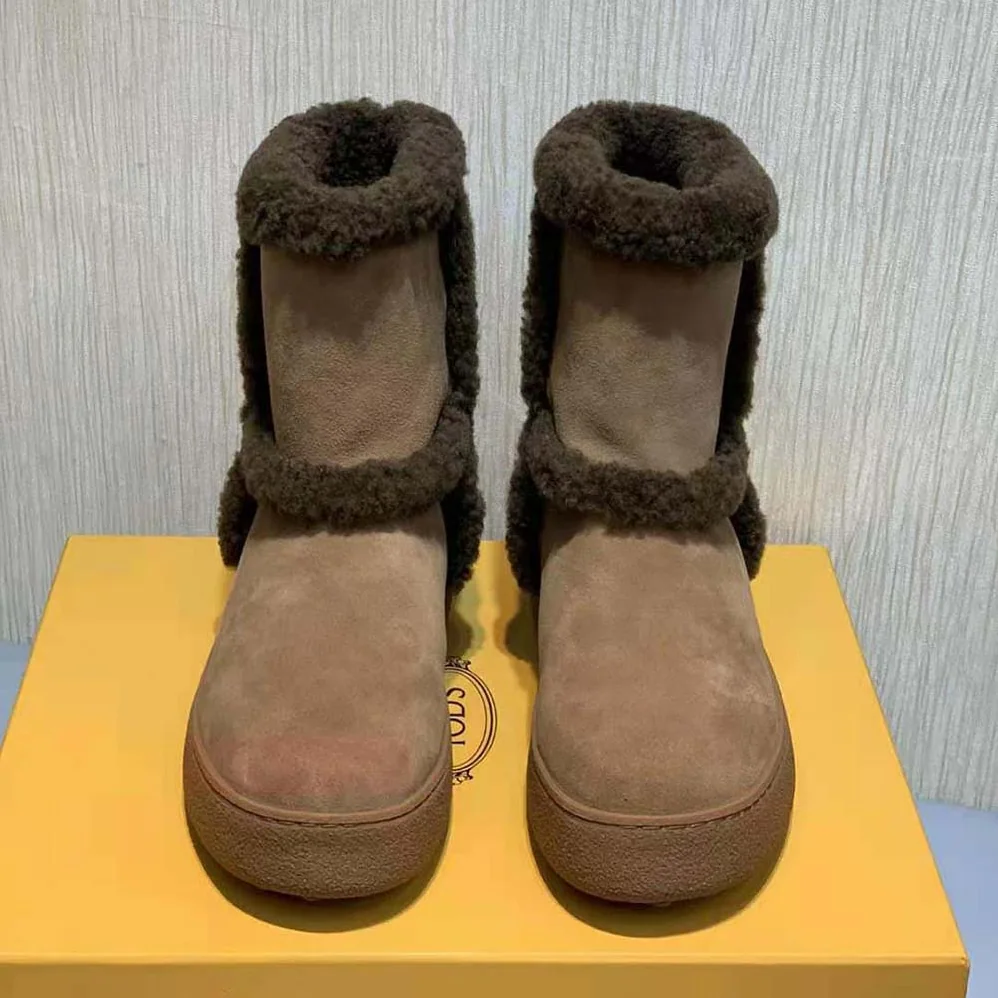 TODS Tod's W. G. Ankle Boots in Suede for Unisex in Brown