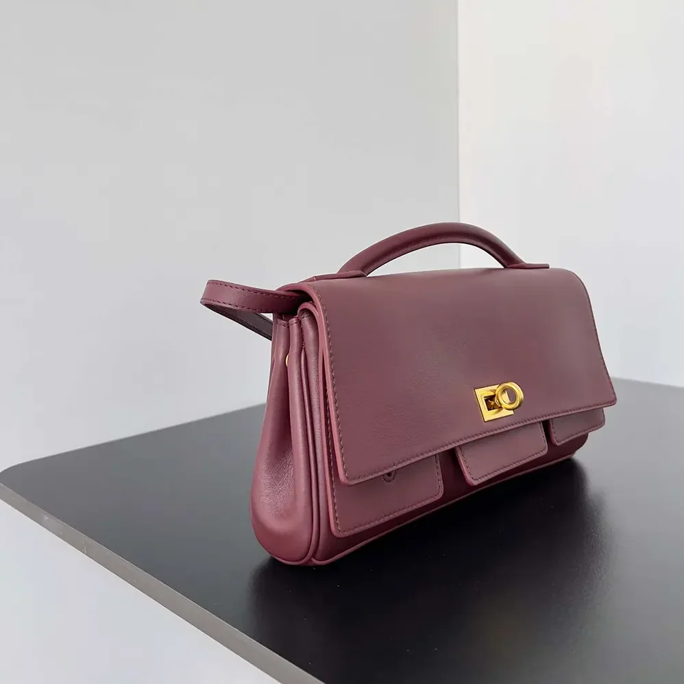 Balenciaga Bel Air Clutch On Strap Small in Dark Burgundy for Women Balenciaga Bel Air Clutch On Strap Small in Dark Burgundy for Women
