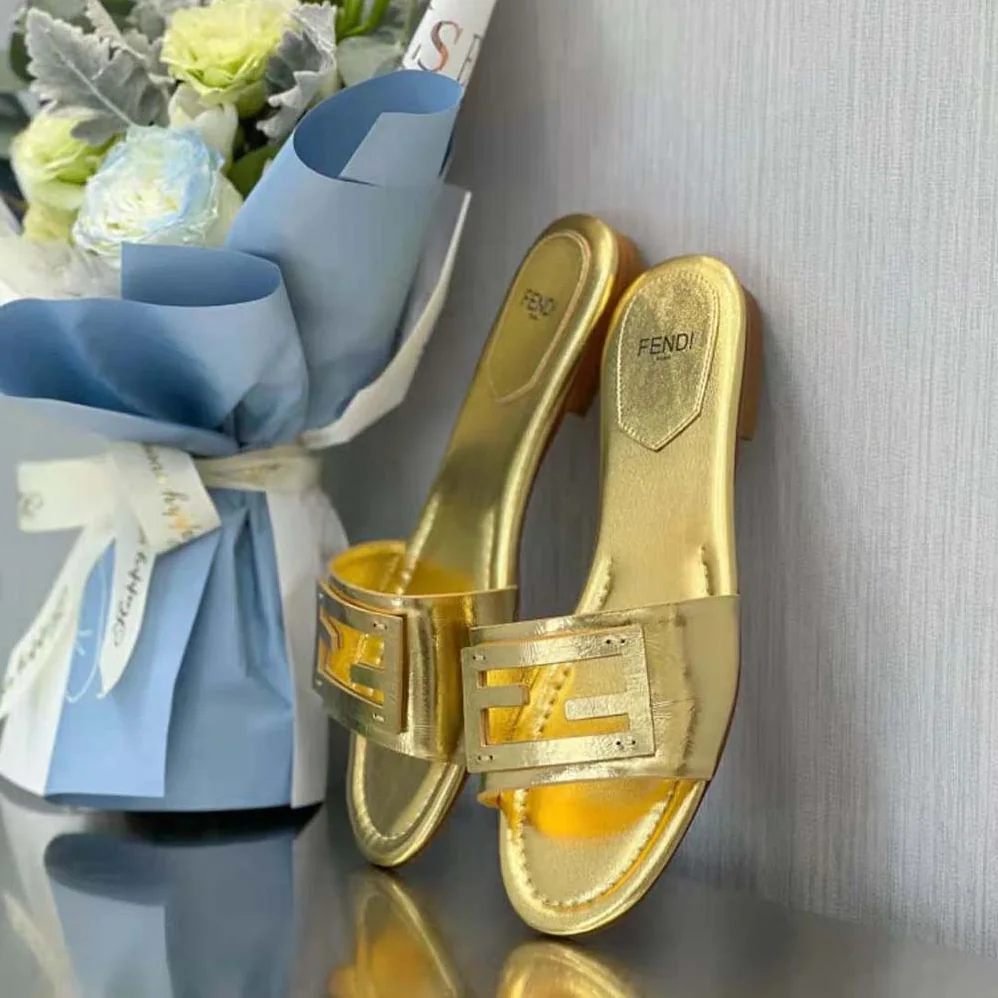 Fendi Baguette Gold Nappa Leather Slides for Women Fendi Baguette Gold Nappa Leather Slides for Women