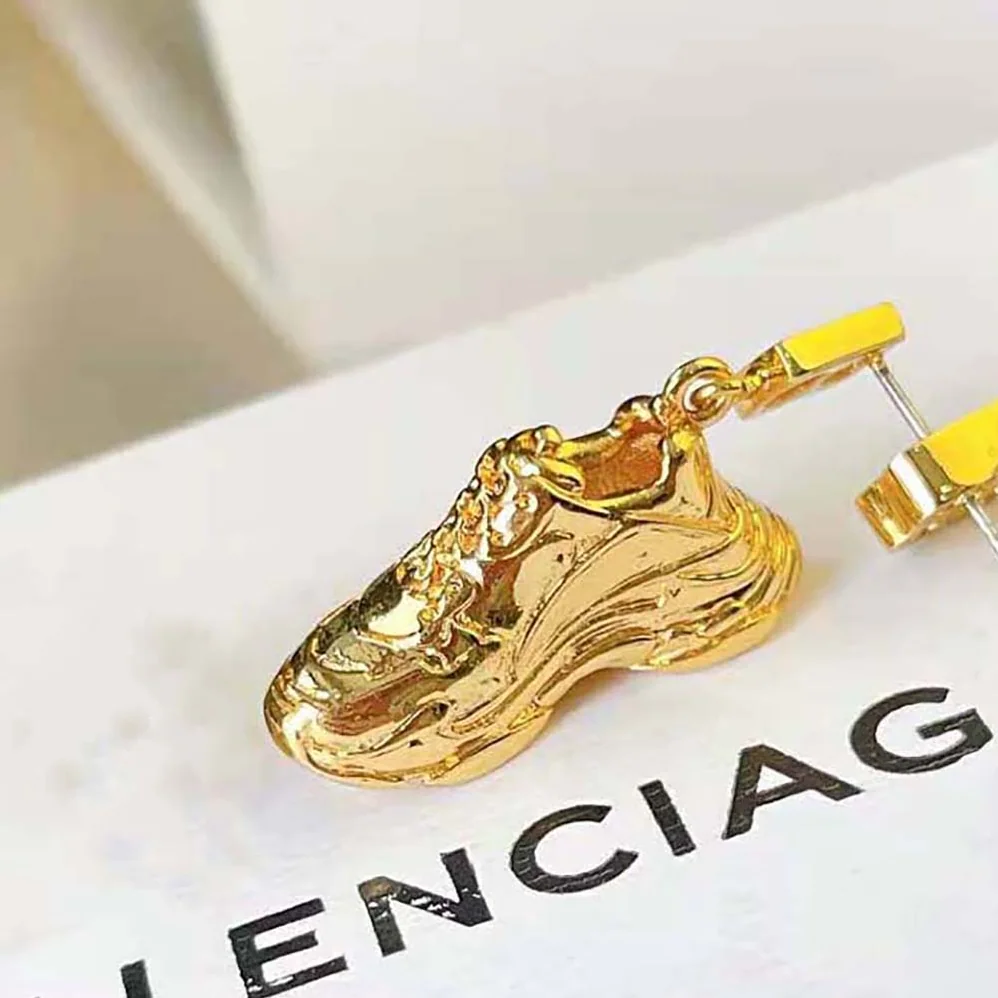 Balenciaga Mini Triple S Earring in Gold Bronze and Brass for Women Balenciaga Mini Triple S Earring in Gold Bronze and Brass for Women