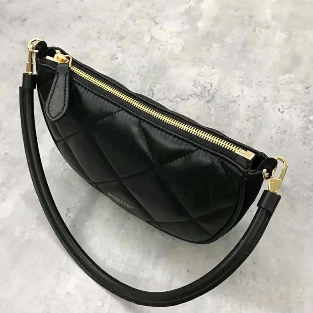 Burberry Quilted Lambskin Olympia Pouch for Women in Black Burberry Quilted Lambskin Olympia Pouch for Women in Black