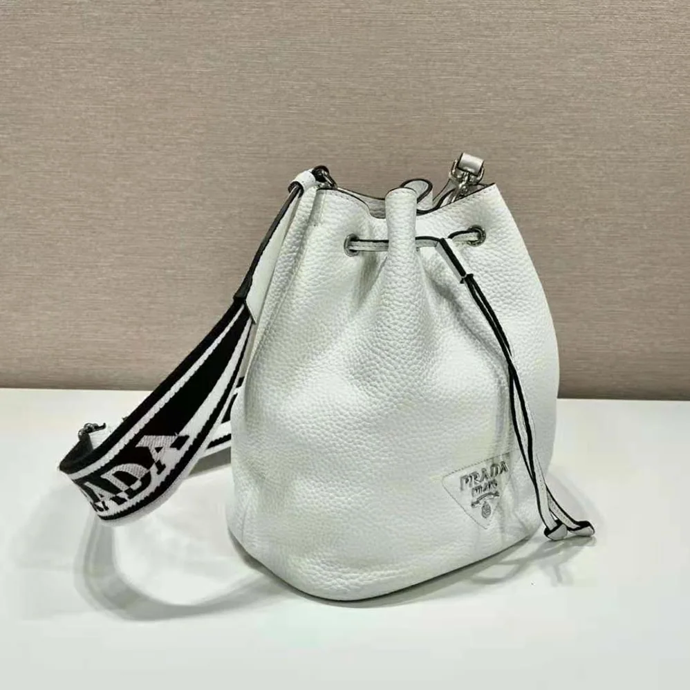 Prada Leather Bucket Bag with A Soft Silhouette for Women in White Prada Leather Bucket Bag with A Soft Silhouette for Women in White