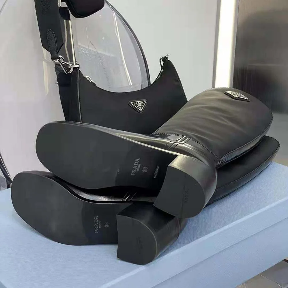 Prada Brushed Leather and Nylon Boots for Women in Black