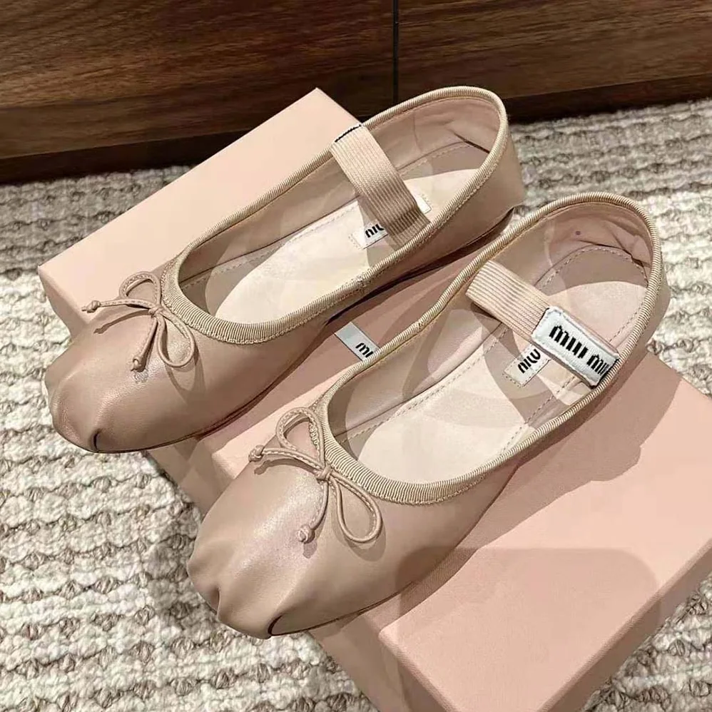Miu Miu Leather Ballerinas with Fabric Logo Label for Women in Beige