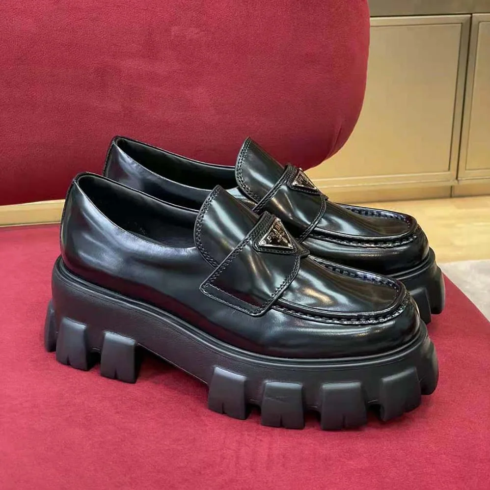 Prada Brushed Leather Monolith Loafers for Unisex in Black