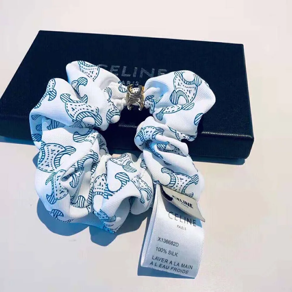 Celine Scrunchy Celine Triomphe Toile De Jouy Bracelet in Brass with Gold Finish and White and Navy Silk for Women Celine Scrunchy Celine Triomphe Toile De Jouy Bracelet in Brass with Gold Finish and White and Navy Silk for Women