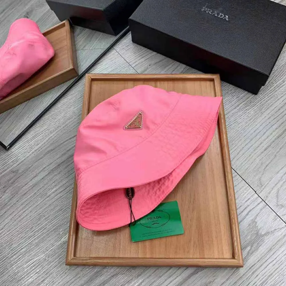 Prada Nylon Bucket Hat Decorated with the Triangle Logo for Women in Pink Prada Nylon Bucket Hat Decorated with the Triangle Logo for Women in Pink
