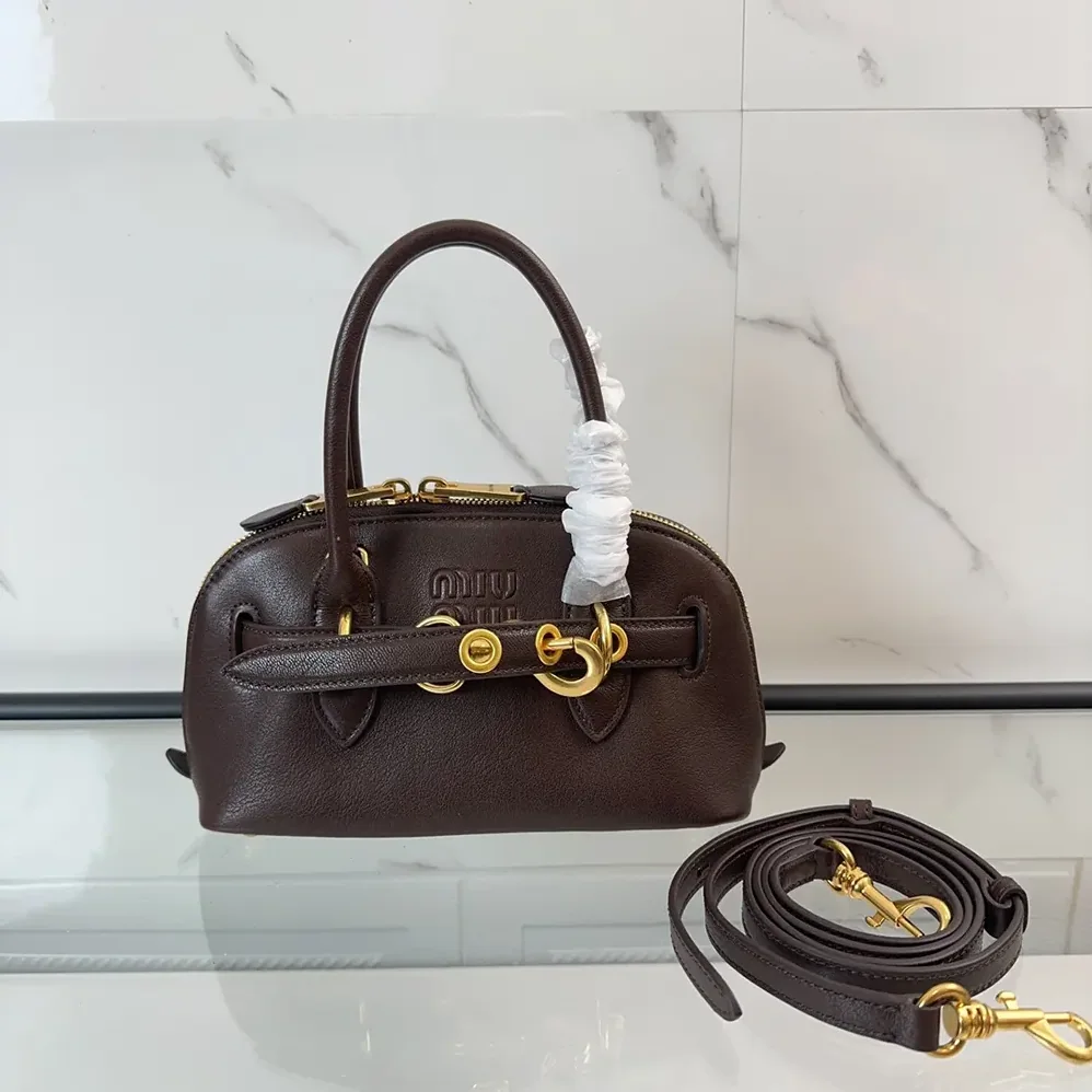 Miu Miu Aventure Nappa Leather Top-handle Bag for Women in Bordeaux Miu Miu Aventure Nappa Leather Top-handle Bag for Women in Bordeaux