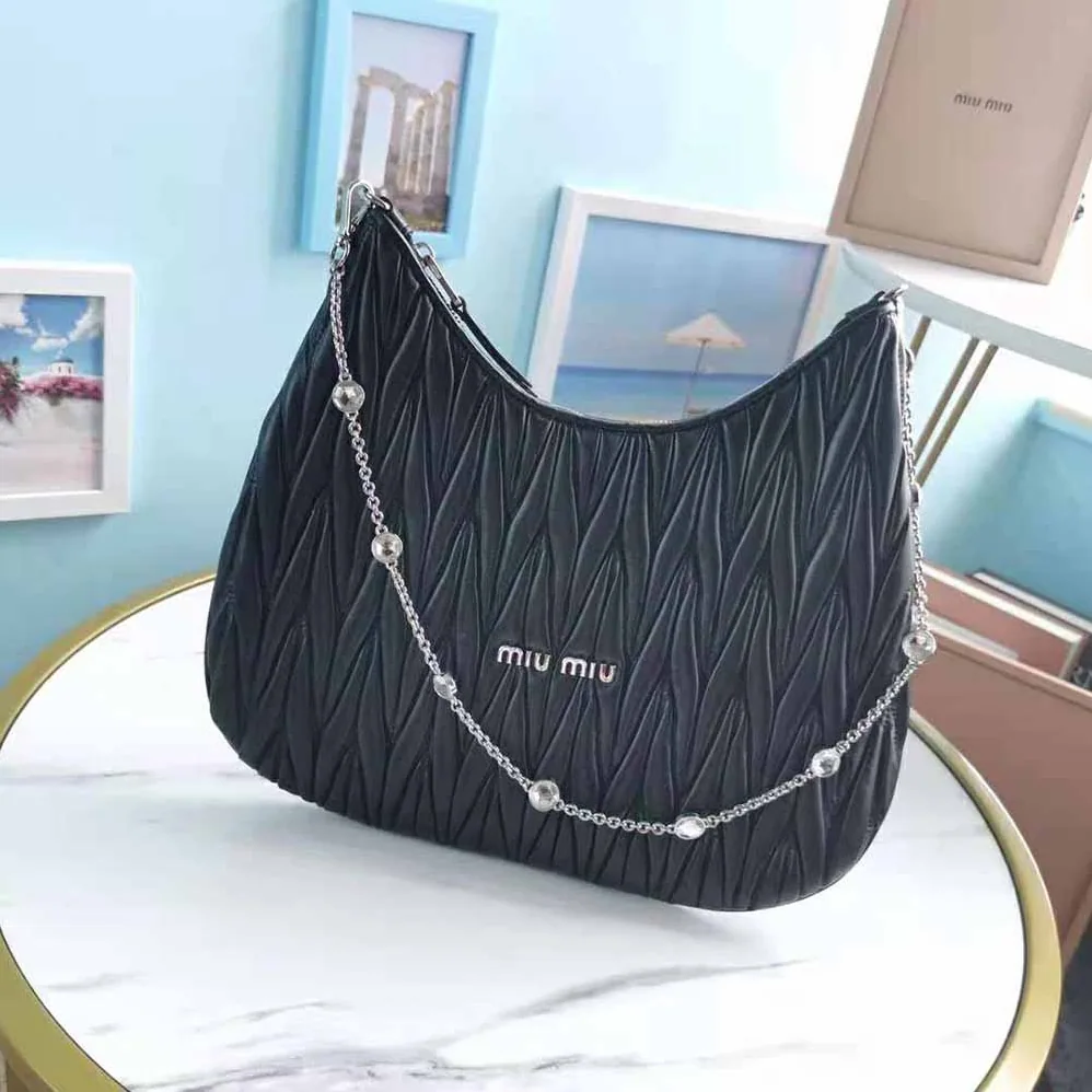Miu Miu Large Matelasse Nappa Leather Shoulder Bag for Women in Black Miu Miu Large Matelasse Nappa Leather Shoulder Bag for Women in Black